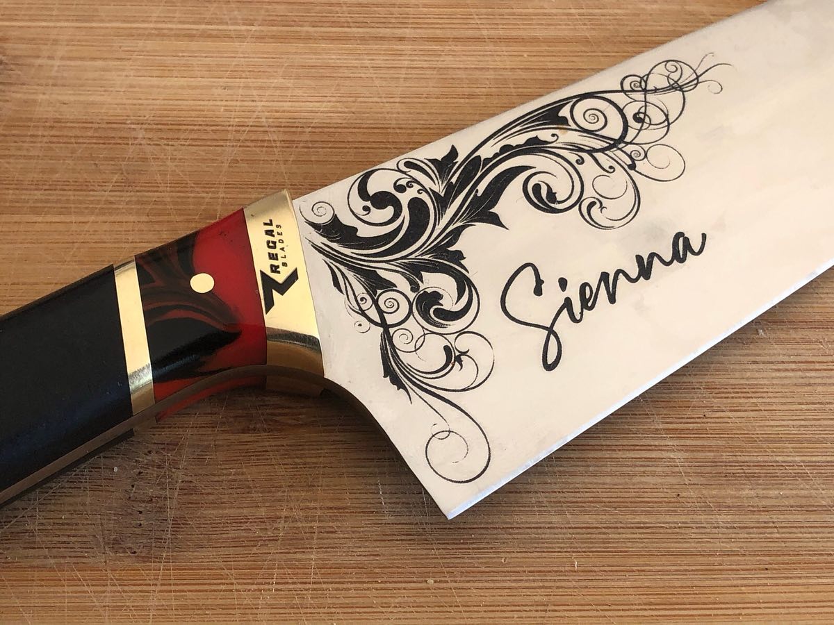 Engraved knife from regal blades