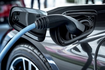 electric-car-at-charging-station-TDVPEFZ
