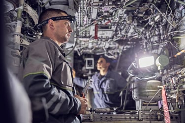 men-mechanics-is-working-inside-the-airplane-2021-09-03-21-02-41-utc